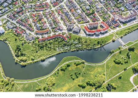 birds eye view of private houses in the Eastern residential district of Minsk, Belarus. panoramic aerial photo in sunny summer day.