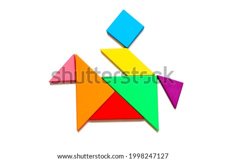 Color tangram puzzle in man ride on the horse shape on white background