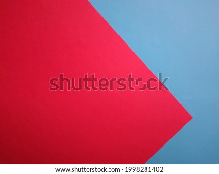 Red and blue color paper background. 