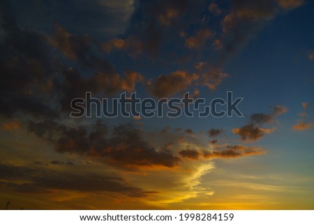 sunrise with clouds, light rays and other atmospheric effect
