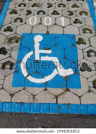 the sign for disable on the parking lot in Kaohsiung design for support concept