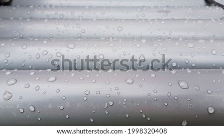 Water drops on plastic pipes. Beautiful drops after the rain.