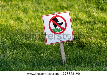 Do not step on grass. Prohibition sign on the lawn. Sign prohibiting walking on the grass