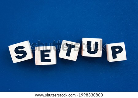 Wooden Blocks with the text: Setup