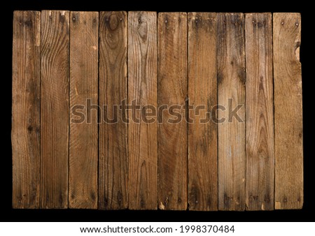 Vintage wooden background from planks with rusty nails isolated on black.