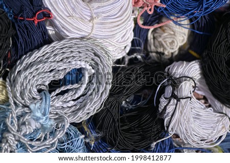A colorful bundle of wool on aflea market in Spain.