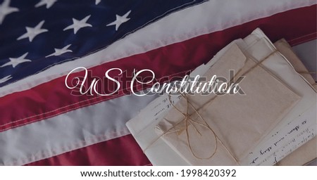 Composition of text us constitution, over antique documents and american flag. patriotism, independence and american constitution celebration concept digitally generated image.
