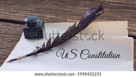 Composition of text us constitution, with quill pen and inkwell on antique documents. patriotism, independence and american constitution celebration concept digitally generated image.