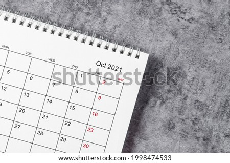 October Calendar 2021 on wooden table background. Royalty-Free Stock Photo #1998474533