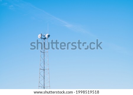 telecommunication towers with blue sky