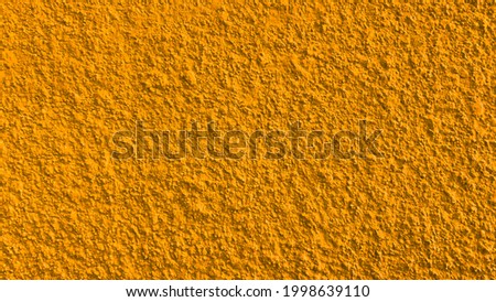 Seamless texture of yellow orange cement wall a rough surface, with space for text, for a background.