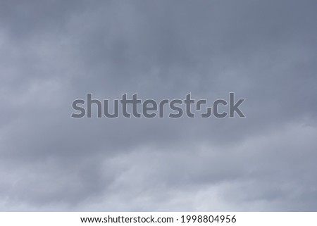 White and gray clouds on a blue sky background