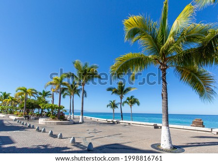 Puerto Vallarta sea promenade, El Malecon, with ocean lookouts, beaches, scenic landscapes hotels and city views Royalty-Free Stock Photo #1998816761