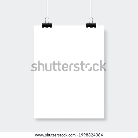 Blank white poster template. White poster mockup isolated on gray wall.