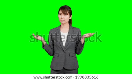 Shrug business woman with chroma key synthesis