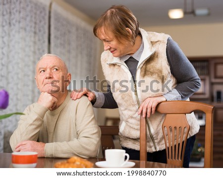 Senior man offended after quarrel with wife. High quality photo