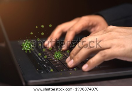 Businessman hand typing keyboard operating computer There are germs, corona virus and bacteria. Abstract concept of safety precautions against epidemic infection and cleanliness of technological equip Royalty-Free Stock Photo #1998874070