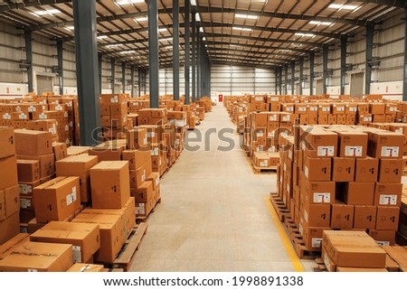 Warehouse, package shipment, freight transportation and delivery concept, cardboard boxes on pallet. Royalty-Free Stock Photo #1998891338