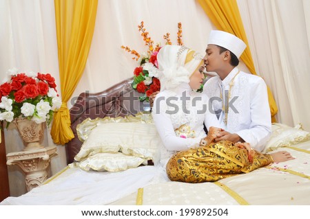 Indonesian bridal couples were pose in their room