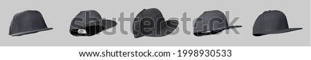 Black snapback cap flat visor fly concept Royalty-Free Stock Photo #1998930533
