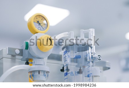 Medical equipment from an ER Emergency Room. Detail view of a lot of tools used for oxigen, syringe and therapy. Royalty-Free Stock Photo #1998984236