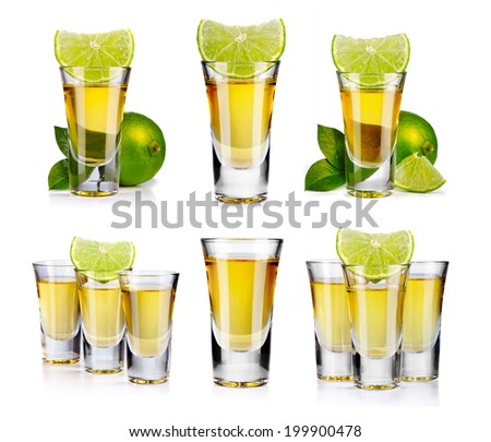 Set of gold tequila shot with lime fruits isolated on white background  Royalty-Free Stock Photo #199900478