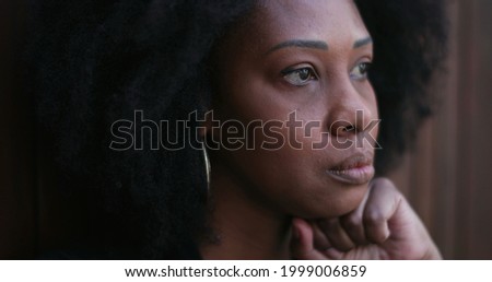 Preoccupied African woman. Pensive stressed black person feeling anxiety.jpeg
