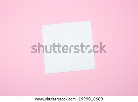 Blank white To Do List Sticker. Close up of reminder note paper on the pink background. Copy space. Minimalism, original and creative photo.