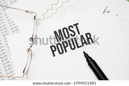 most popular . Conceptual background with chart ,papers, pen and glasses