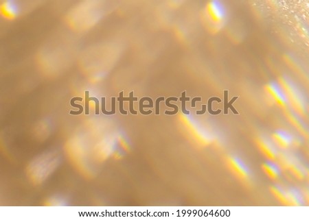 Blurry golden glitter background texture Royalty-Free Stock Photo #1999064600