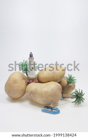 A mini figure fishing at the potatoes