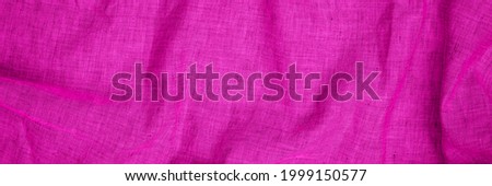 Pink linen fabric background. Viva Magenta colored cloth. Canvas background. Fuchsia colored fabric. Pink pure linen texture. Banner