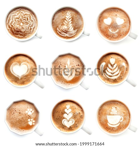 Cups of hot latte coffee on white background