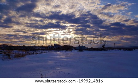 Walk on the frozen sea at sunset