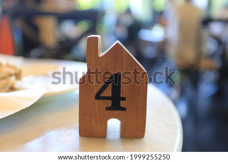 Number sign, used to tell the queue, design, made of wood
