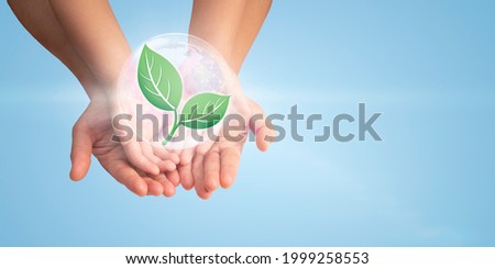 Mother and Child’s hand holding young plant and eco icon on blue background, Environmental, Ecology and eco earth day concept.