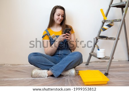 woman blogger makes renovation in the apartment and recording online video blog. repair tips and tricks