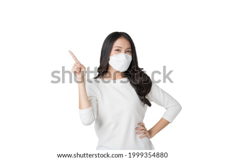 Young Asian woman wearing hygienic mask to prevent infection corona virus Air pollution pm2.5 in isolated on white background Royalty-Free Stock Photo #1999354880