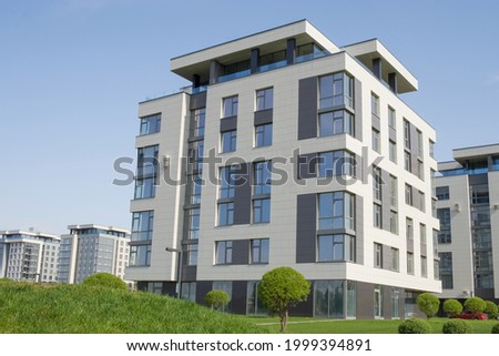 Modern urban architecture. A group of newly built houses. Residential complex. Realty. 