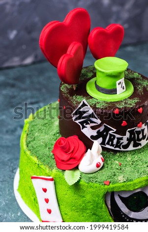 Green cake Alice in wonderland with mastic sweet hat