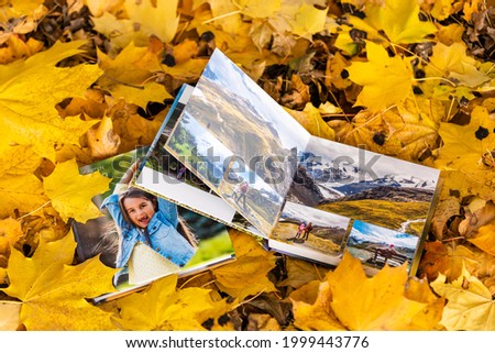 beautiful photo album cover on autumn leaves