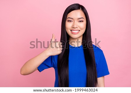 Photo of attractive young happy woman make thumb up good mood recommend isolated on pink color background