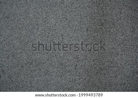 Finely patterned marble texture. Dark gray stone surface background