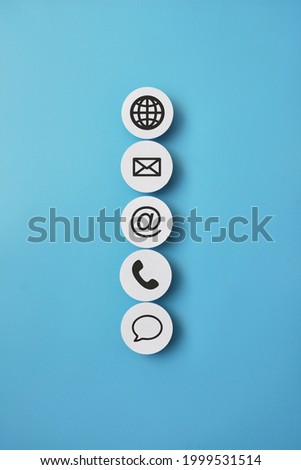 Icons of business communication on paper circles. The symbol of working in the network