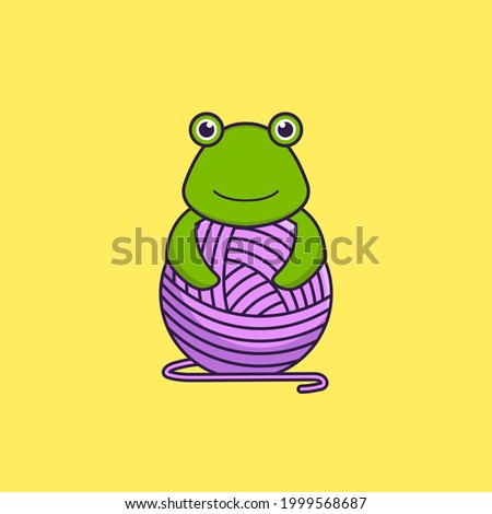 Cute frog playing with wool yarn. Animal cartoon concept isolated. Can used for t-shirt, greeting card, invitation card or mascot.