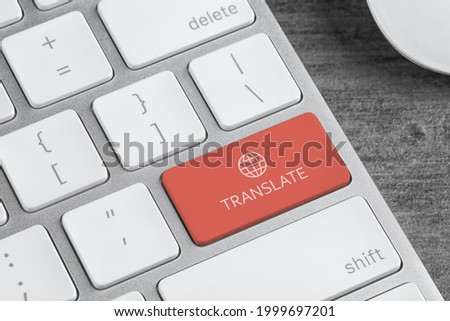 Modern computer keyboard with button for quick translation, closeup