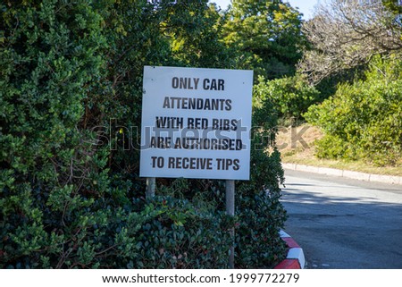 Sign next to a parking lot in South Africa