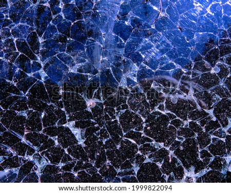 abstract blue and black cracked screen background	
