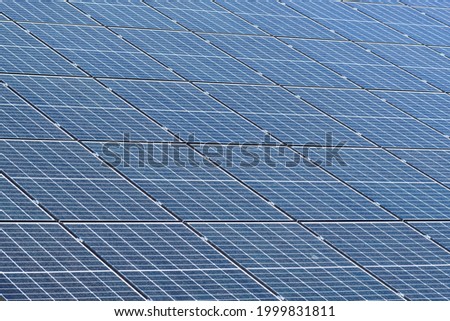 Green energy background made of solar panels