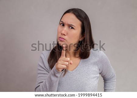 Angry mother scolding on background with space for text. Royalty-Free Stock Photo #1999894415